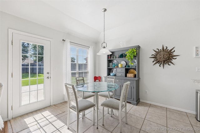 14907 E 88th St N, Owasso, OK 74055 - dining room with healthy amount of natural light and vaulted ceiling