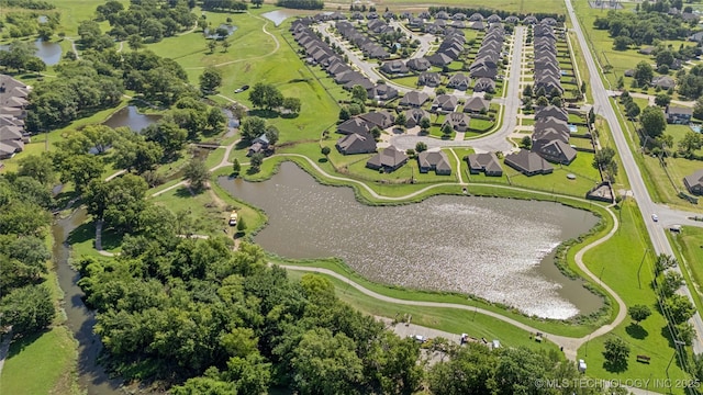 14907 E 88th St N, Owasso, OK 74055 - aerial view of property's location with a large body of water and nearby suburban area