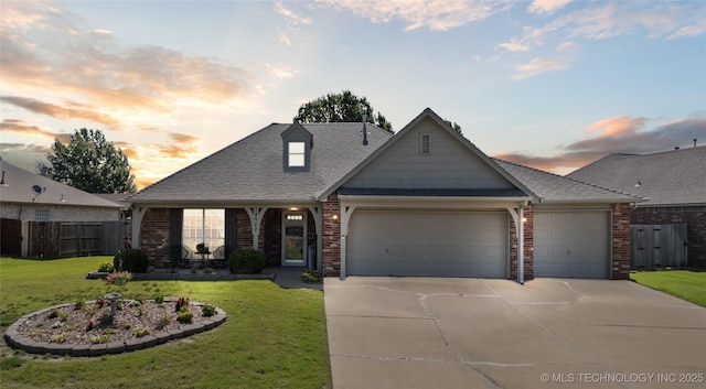 14907 E 88th St N, Owasso, OK 74055 - view of front of property with an attached garage, concrete driveway, brick siding, and a shingled roof