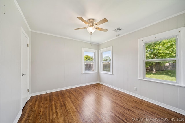 1448 S Darlington Ave, Tulsa, OK 74112 - unfurnished room featuring wood finished floors, plenty of natural light, a ceiling fan, and ornamental molding