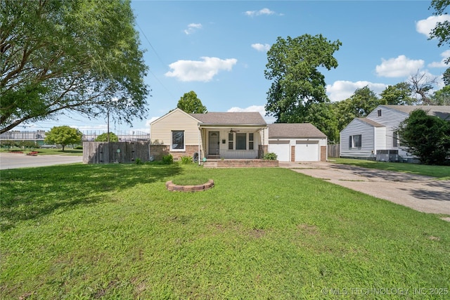 1448 S Darlington Ave, Tulsa, OK 74112 - view of front facade with a garage, brick siding, and a porch
