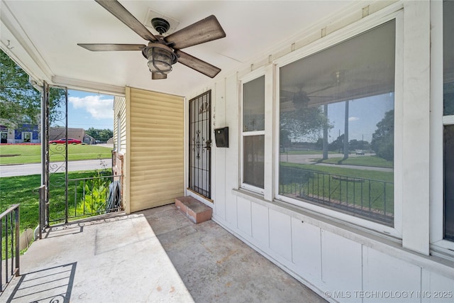 1448 S Darlington Ave, Tulsa, OK 74112 - covered porch with ceiling fan