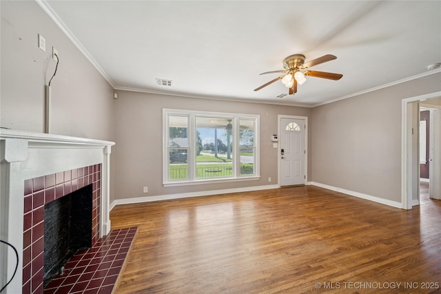 1448 S Darlington Ave, Tulsa, OK 74112 - unfurnished living room featuring a fireplace, ceiling fan, wood finished floors, and crown molding