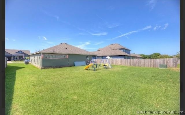 12005 E 108th Pl N, Owasso, OK 74055 - view of yard featuring a playground