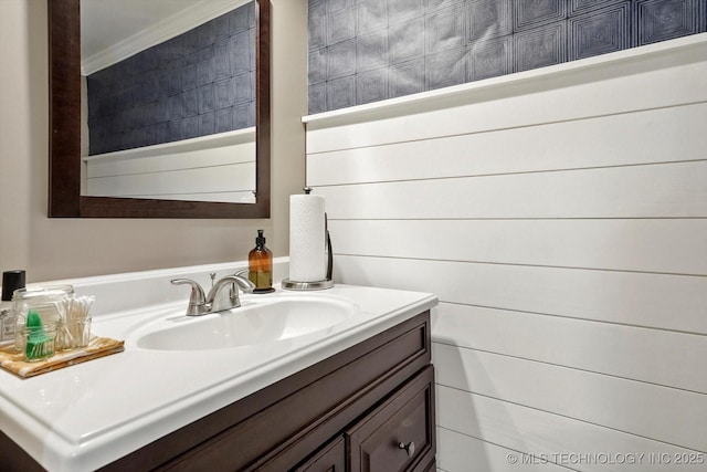 2955 E 84th St S Unit 65, Tulsa, OK 74137 - bathroom featuring vanity, wallpapered walls, and ornamental molding