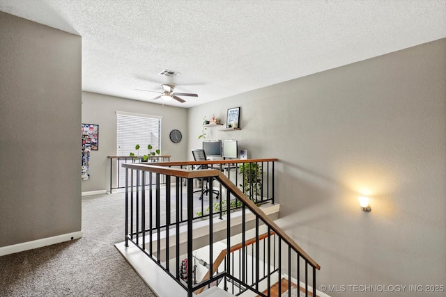 2955 E 84th St S Unit 65, Tulsa, OK 74137 - stairway featuring carpet floors, ceiling fan, and a textured ceiling