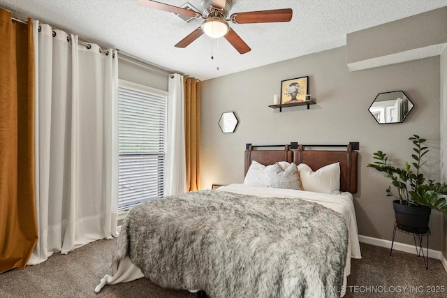 2955 E 84th St S Unit 65, Tulsa, OK 74137 - bedroom with dark carpet, a textured ceiling, and ceiling fan