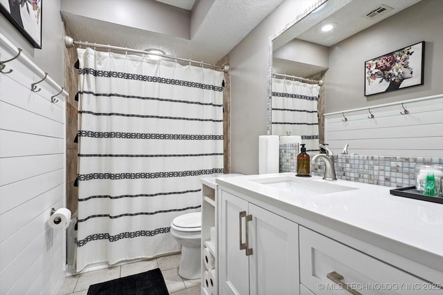 2955 E 84th St S Unit 65, Tulsa, OK 74137 - full bathroom featuring vanity, tile patterned flooring, decorative backsplash, and a shower with curtain