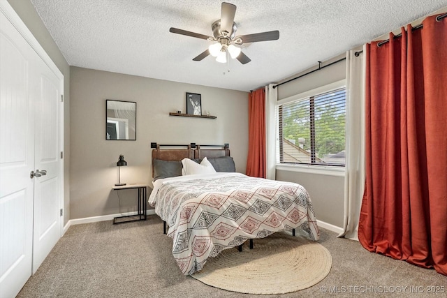 2955 E 84th St S Unit 65, Tulsa, OK 74137 - carpeted bedroom with a textured ceiling and ceiling fan
