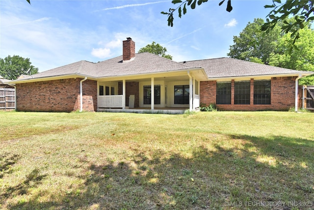 7020 E 89th St, Tulsa, OK 74133 - back of property with a chimney and brick siding