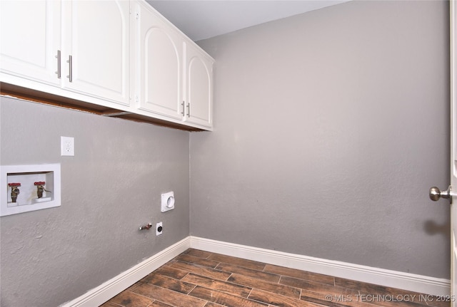 7020 E 89th St, Tulsa, OK 74133 - laundry room with hookup for a washing machine, cabinet space, dark wood-style floors, hookup for an electric dryer, and gas dryer hookup
