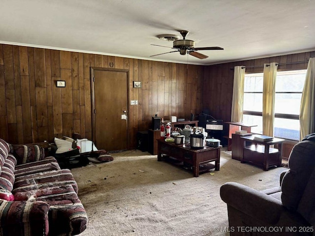 8348 E 7th St S, Tulsa, OK 74112 - living area featuring light colored carpet, a ceiling fan, wood walls, and ornamental molding