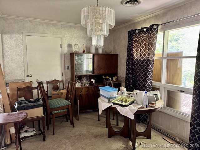 8348 E 7th St S, Tulsa, OK 74112 - dining room featuring a chandelier, light carpet, and ornamental molding