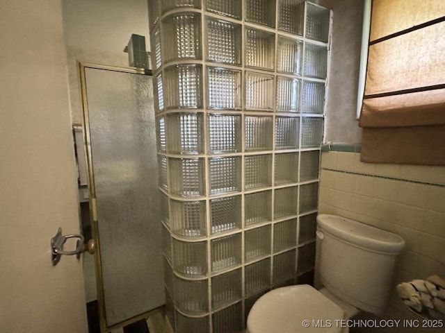 8348 E 7th St S, Tulsa, OK 74112 - bathroom with walk in shower and tile walls