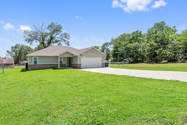802 NE 9th St, Wagoner, OK 74467 - ranch-style home with an attached garage, driveway, and brick siding