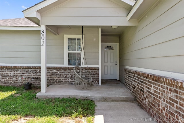 802 NE 9th St, Wagoner, OK 74467 - entrance to property with covered porch