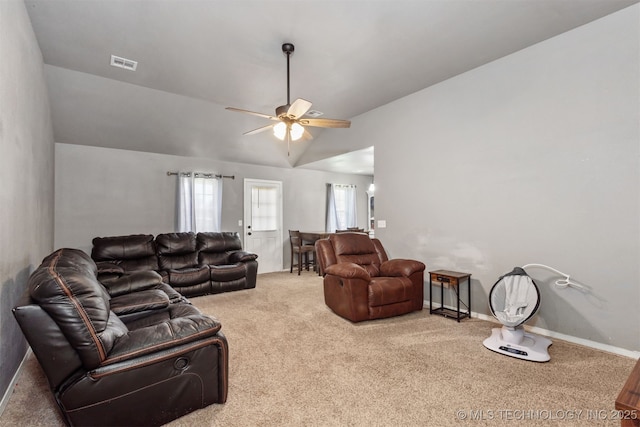 802 NE 9th St, Wagoner, OK 74467 - carpeted living area with ceiling fan and baseboards