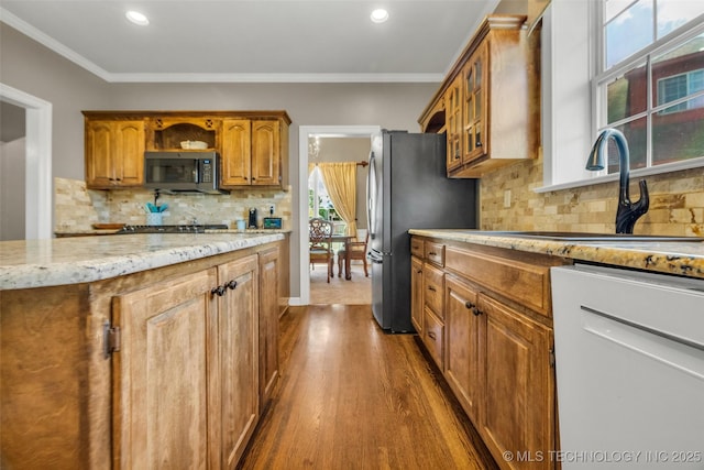 13804 E 90th St, Owasso, OK 74055 - kitchen featuring stainless steel appliances, brown cabinets, glass insert cabinets, light stone counters, and dark wood-style flooring