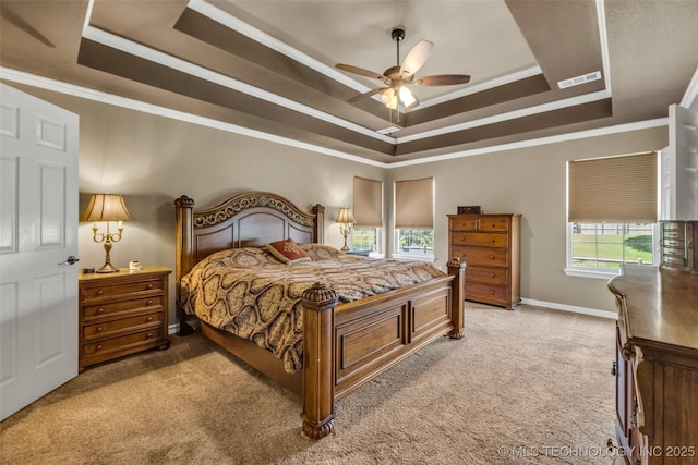 13804 E 90th St, Owasso, OK 74055 - bedroom with a raised ceiling, light colored carpet, multiple windows, and ornamental molding
