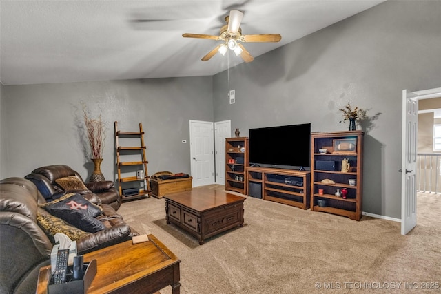 13804 E 90th St, Owasso, OK 74055 - living room featuring ceiling fan, light carpet, and vaulted ceiling