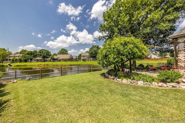 13804 E 90th St, Owasso, OK 74055 - view of yard with a water view, a residential view, and a patio area