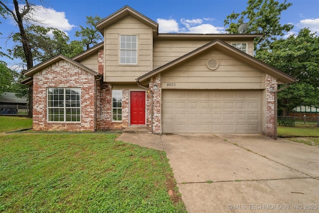 8973 N Crestwood Dr, Sperry, OK 74073 - view of front of home featuring concrete driveway, a front yard, an attached garage, and brick siding