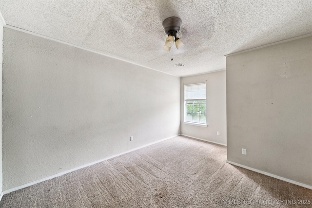 8973 N Crestwood Dr, Sperry, OK 74073 - empty room featuring ceiling fan, carpet, and a textured ceiling