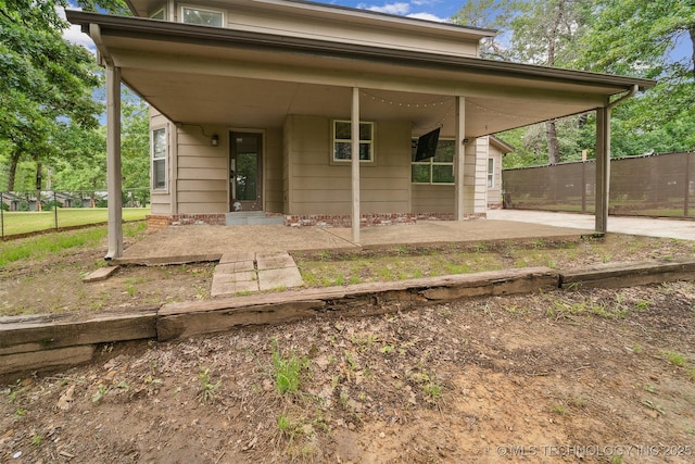 8973 N Crestwood Dr, Sperry, OK 74073 - rear view of house featuring a patio