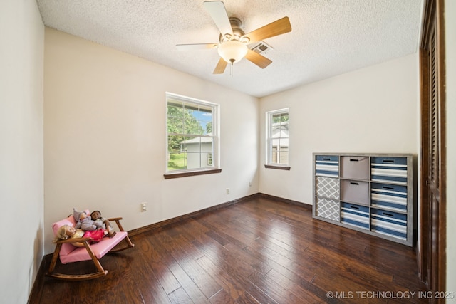 11783 S 252nd E Ave E, Broken Arrow, OK 74014 - spare room with a textured ceiling, hardwood / wood-style floors, and a ceiling fan