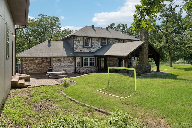 11783 S 252nd E Ave E, Broken Arrow, OK 74014 - rear view of house featuring brick siding, a chimney, and a lawn