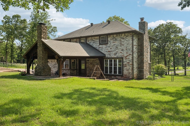 11783 S 252nd E Ave E, Broken Arrow, OK 74014 - back of house featuring a chimney and brick siding