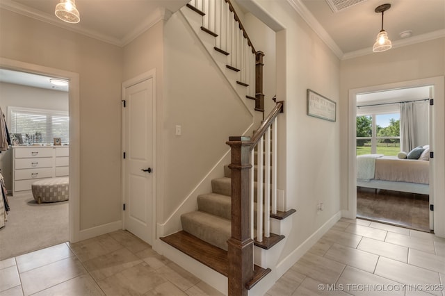 22322 E 121st St S, Broken Arrow, OK 74014 - stairs featuring ornamental molding and tile patterned flooring