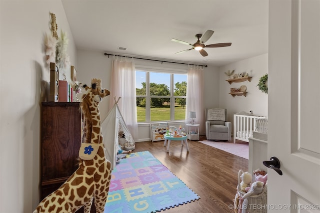 22322 E 121st St S, Broken Arrow, OK 74014 - bedroom with wood finished floors and a ceiling fan
