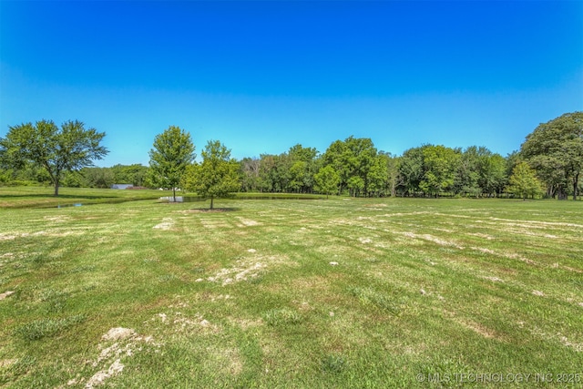 22322 E 121st St S, Broken Arrow, OK 74014 - view of green lawn featuring a view of rural / pastoral area