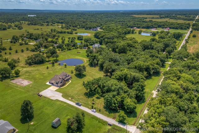 22322 E 121st St S, Broken Arrow, OK 74014 - view of property location with a large body of water and a heavily wooded area