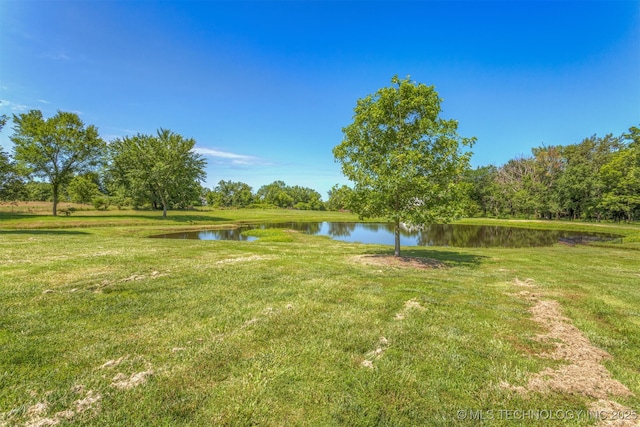 22322 E 121st St S, Broken Arrow, OK 74014 - view of grassy yard with a water view