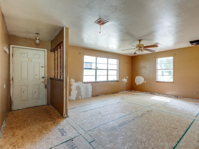 310 E Division, Roff, OK 74865 - entryway with a ceiling fan and a textured ceiling