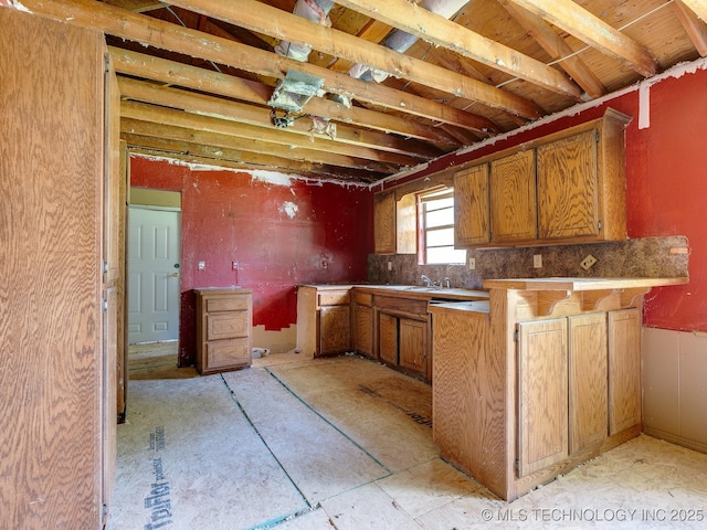 310 E Division, Roff, OK 74865 - kitchen with a peninsula and brown cabinetry