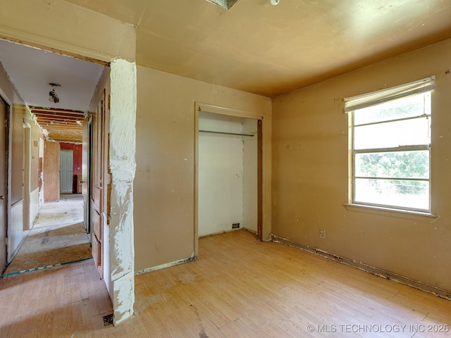 310 E Division, Roff, OK 74865 - unfurnished bedroom featuring light wood-style floors and a closet