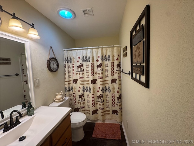 769 Terrace Dr, Prue, OK 74060 - bathroom with vanity, a shower with curtain, and a textured wall