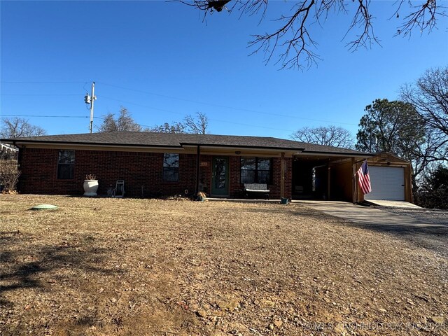 769 Terrace Dr, Prue, OK 74060 - single story home with brick siding, a carport, and driveway