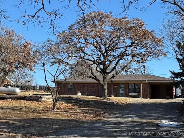 769 Terrace Dr, Prue, OK 74060 - single story home with brick siding and gravel driveway