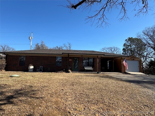 769 Terrace Dr, Prue, OK 74060 - ranch-style home featuring brick siding, a carport, and covered porch