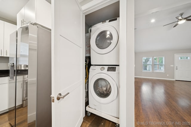 4534 E 5th Pl, Tulsa, OK 74112 - washroom featuring stacked washer / dryer, ceiling fan, and dark wood finished floors