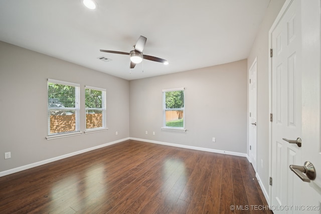 4534 E 5th Pl, Tulsa, OK 74112 - unfurnished bedroom with dark wood-type flooring, a ceiling fan, and recessed lighting