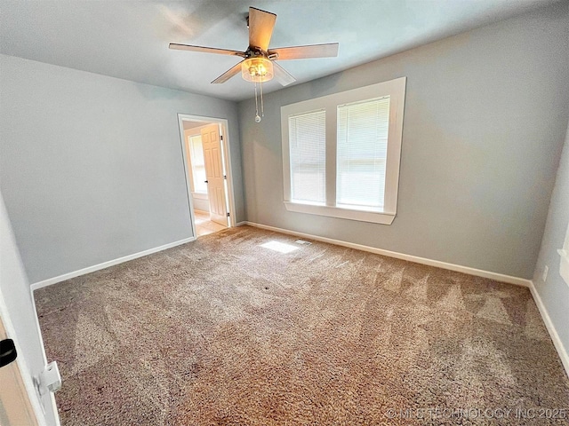 609 E Ward St, Tahlequah, OK 74464 - carpeted spare room featuring a ceiling fan and baseboards