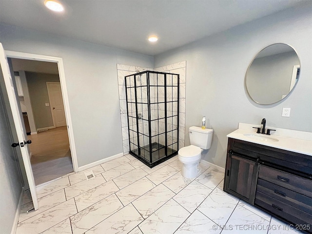 609 E Ward St, Tahlequah, OK 74464 - bathroom with vanity, a tile shower, marble look tiles, and recessed lighting