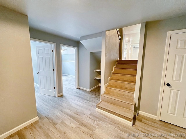609 E Ward St, Tahlequah, OK 74464 - staircase featuring wood finished floors