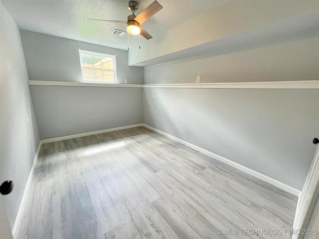 609 E Ward St, Tahlequah, OK 74464 - unfurnished room with a ceiling fan and wood finished floors
