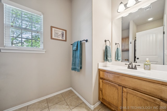 445 S Cypress Ave, Broken Arrow, OK 74012 - bathroom featuring vanity and tile patterned flooring